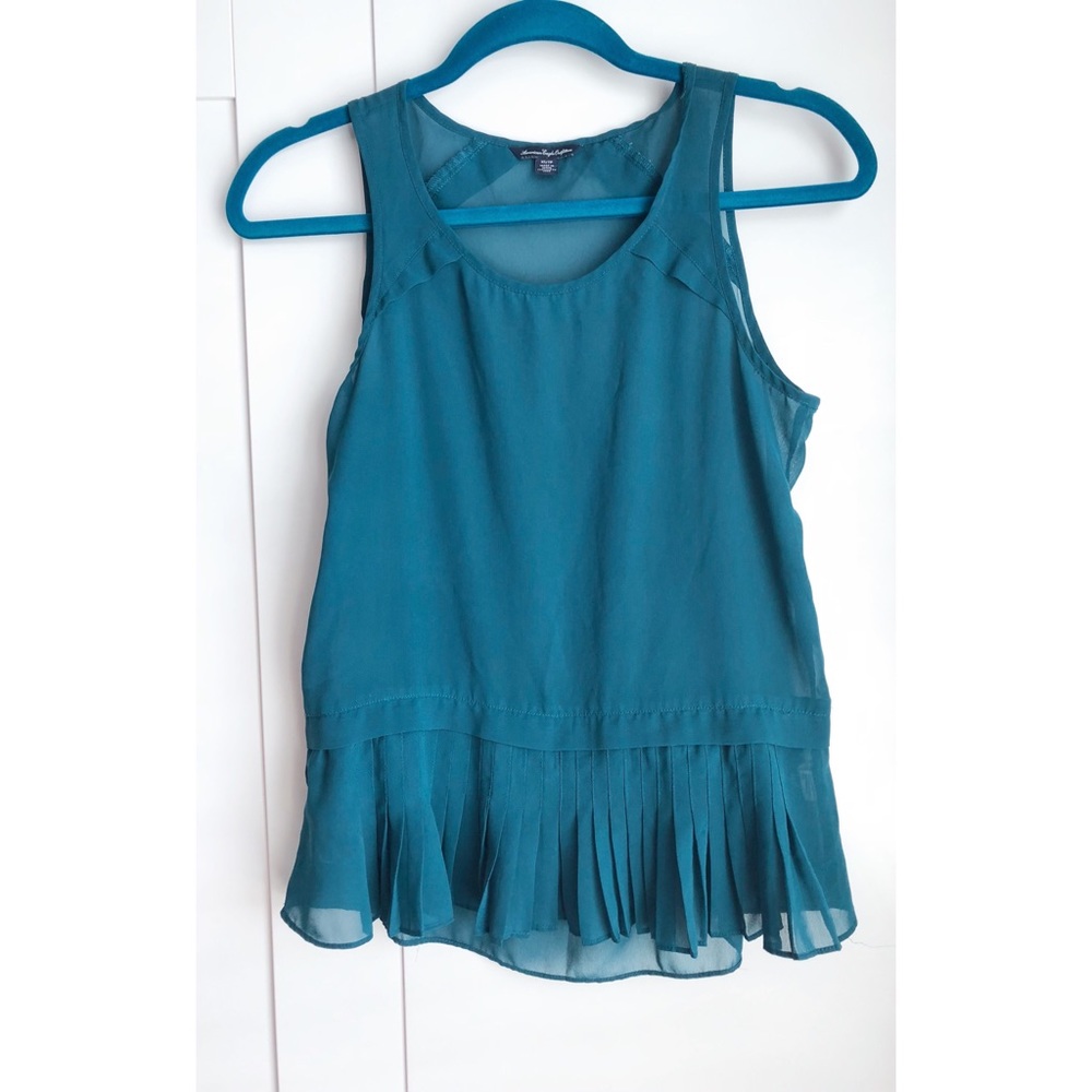 Sheer turquoise shirt